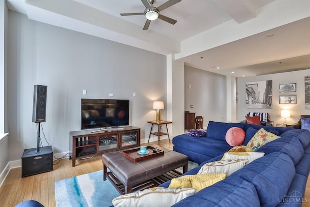 living area with wood finished floors, ceiling fan, baseboards, and recessed lighting