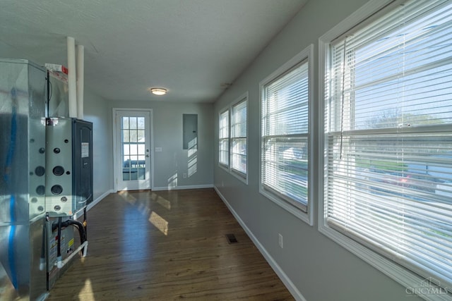 819 E Main St, West Union, OH 45693 - doorway featuring wood finished floors and baseboards