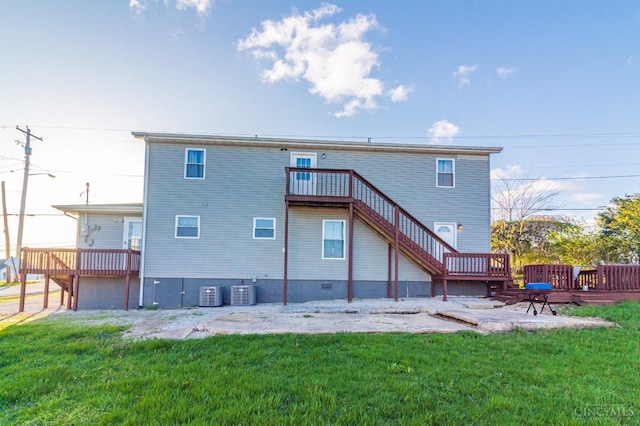 819 E Main St, West Union, OH 45693 - back of house featuring a wooden deck and a yard