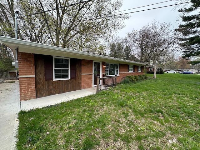 41 Wolfer Dr, Batavia Twp, OH 45102 - ranch-style house featuring a front yard and brick siding