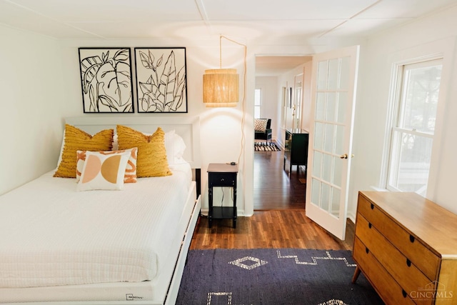 bedroom featuring wood finished floors