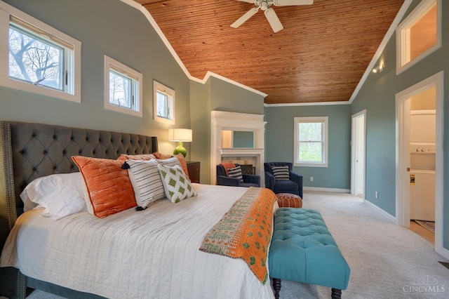 carpeted bedroom with ceiling fan, baseboards, ornamental molding, wood ceiling, and lofted ceiling