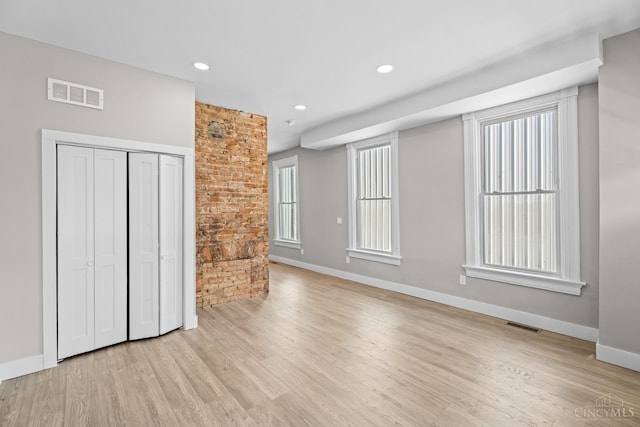 1318 Knowlton St, Cincinnati, OH 45223 - unfurnished living room with baseboards, visible vents, recessed lighting, and light wood-style floors