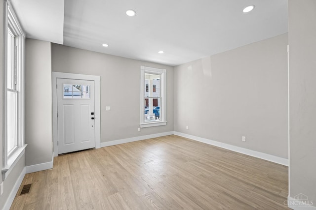 1318 Knowlton St, Cincinnati, OH 45223 - foyer entrance with baseboards, visible vents, light wood finished floors, and recessed lighting
