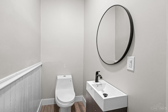 1318 Knowlton St, Cincinnati, OH 45223 - half bathroom featuring toilet and wood finished floors