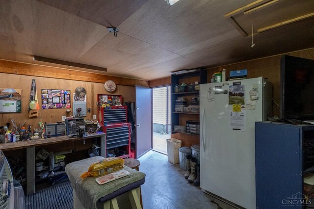 6651 Wizard Of Oz Way, Paint Twp, OH 45133 - home office featuring wood walls, attic access, and concrete flooring