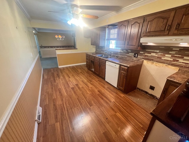 kitchen featuring ceiling fan, a sink, dishwasher, under cabinet range hood, and ornamental molding