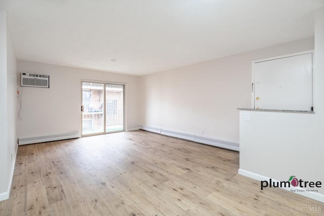 3640 Westwood Northern Blvd Unit 24, Cheviot, OH 45211 - unfurnished room featuring baseboards, wood finished floors, and baseboard heating