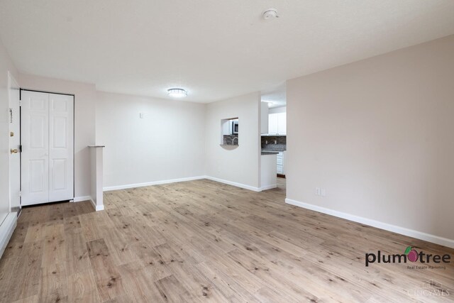 3640 Westwood Northern Blvd Unit 24, Cheviot, OH 45211 - below grade area with light wood-style flooring and baseboards