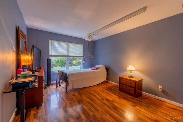 10701 Stone Ridge Way, Harrison, OH 45030 - bedroom with baseboards and wood finished floors
