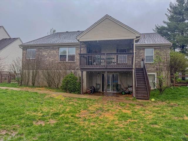 10701 Stone Ridge Way, Harrison, OH 45030 - back of house featuring a wooden deck, a lawn, stairs, and brick siding