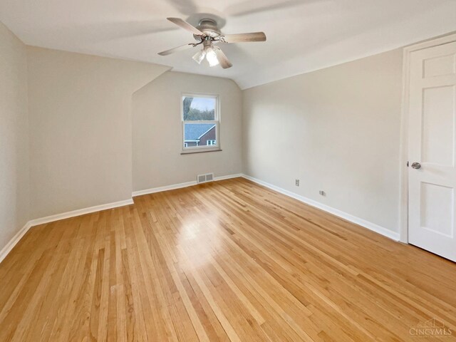 7046 Beechmont Ave, Anderson Twp, OH 45230 - bonus room featuring vaulted ceiling, a ceiling fan, baseboards, and light wood-style flooring