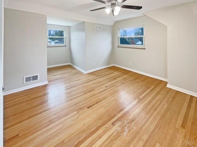 7046 Beechmont Ave, Anderson Twp, OH 45230 - unfurnished room with ceiling fan, light wood finished floors, and baseboards