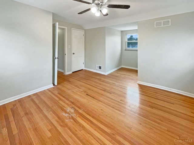 7046 Beechmont Ave, Anderson Twp, OH 45230 - unfurnished room featuring ceiling fan, baseboards, and light wood-style flooring