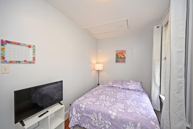 bedroom with attic access