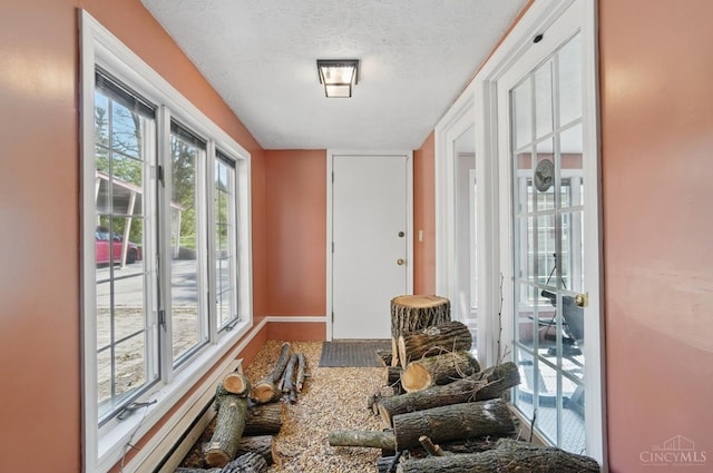 413 N Marshall Rd, Middletown, OH 45042 - entryway featuring a textured ceiling and baseboards