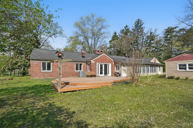 413 N Marshall Rd, Middletown, OH 45042 - back of property featuring a deck, brick siding, a lawn, and a chimney