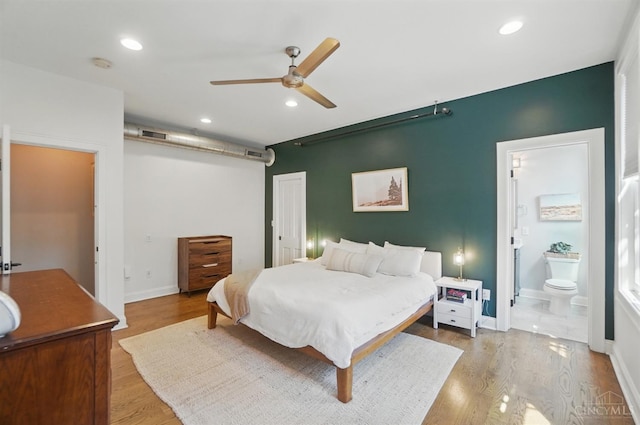 1308 Broadway St Unit 2, Cincinnati, OH 45202 - bedroom with recessed lighting, ensuite bath, wood finished floors, and baseboards