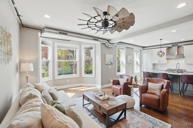 1308 Broadway St Unit 2, Cincinnati, OH 45202 - living area with wood finished floors, recessed lighting, baseboards, and a ceiling fan