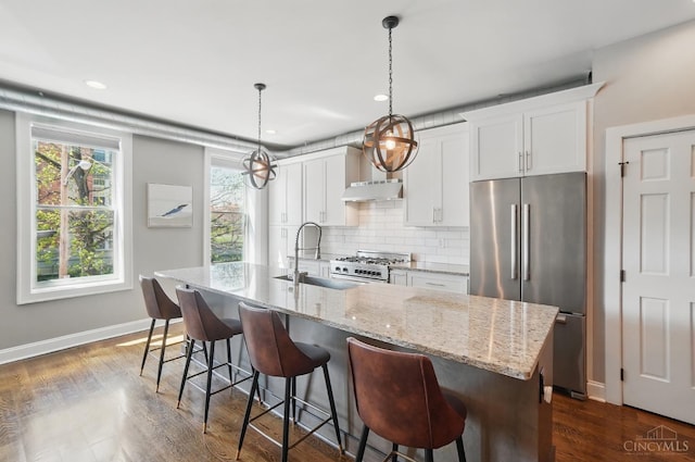 1308 Broadway St Unit 2, Cincinnati, OH 45202 - kitchen with appliances with stainless steel finishes, a sink, exhaust hood, a center island with sink, and white cabinets