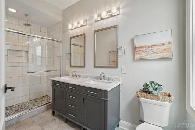 1308 Broadway St Unit 2, Cincinnati, OH 45202 - bathroom with double vanity, a shower stall, toilet, and tile patterned floors