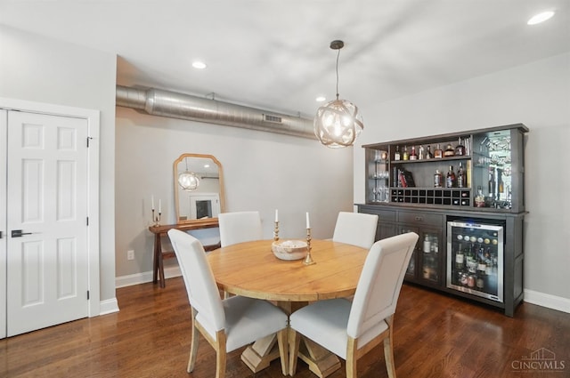 1308 Broadway St Unit 2, Cincinnati, OH 45202 - dining room featuring wine cooler, a bar, recessed lighting, dark wood finished floors, and baseboards