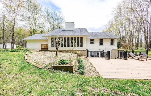4092 Snowhill Rd, Perry Twp, OH 45118 - back of house with a wooden deck, a chimney, and a yard