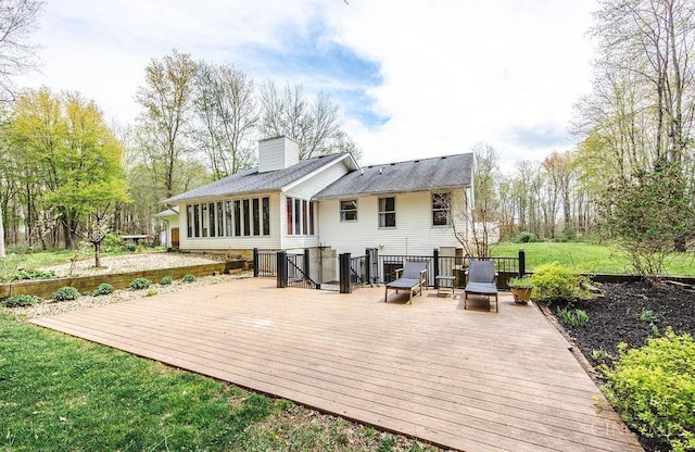 4092 Snowhill Rd, Perry Twp, OH 45118 - back of house with a shingled roof, a chimney, and a deck