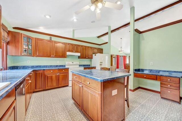 4092 Snowhill Rd, Perry Twp, OH 45118 - kitchen featuring brown cabinets, under cabinet range hood, light floors, dark countertops, and white appliances