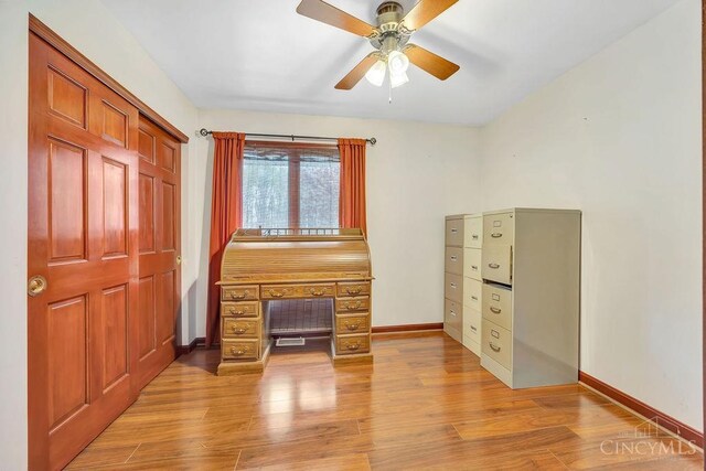 4092 Snowhill Rd, Perry Twp, OH 45118 - bedroom with ceiling fan, baseboards, and light wood-type flooring