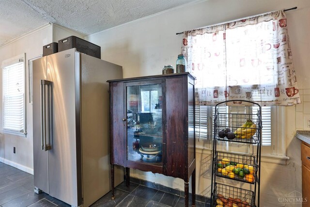 115 Maple Ave, Lebanon, OH 45036 - interior space featuring high end fridge, a textured ceiling, and crown molding