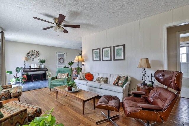 115 Maple Ave, Lebanon, OH 45036 - living area featuring wood-type flooring, a textured ceiling, and a ceiling fan