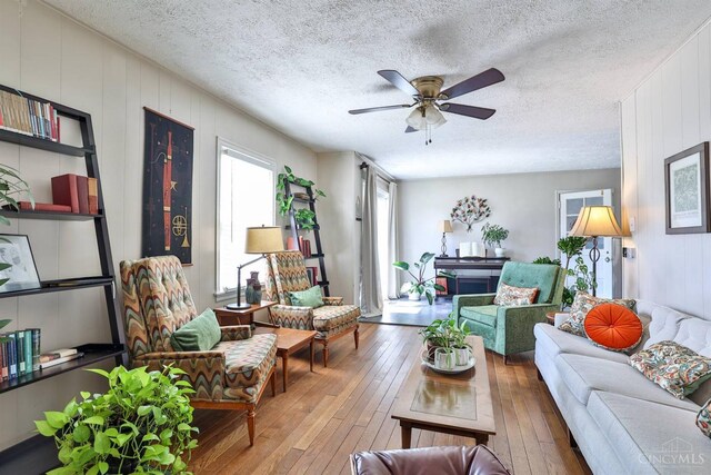 115 Maple Ave, Lebanon, OH 45036 - living room with a textured ceiling, hardwood / wood-style flooring, and ceiling fan