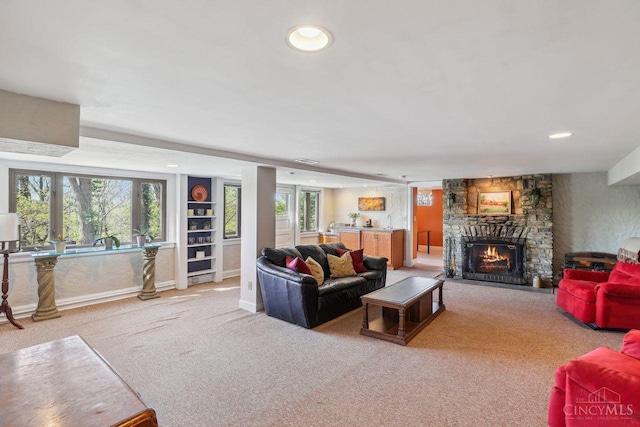 3725 Dogwood Ln, Columbia Twp, OH 45213 - living room with carpet floors, a fireplace, healthy amount of natural light, and recessed lighting