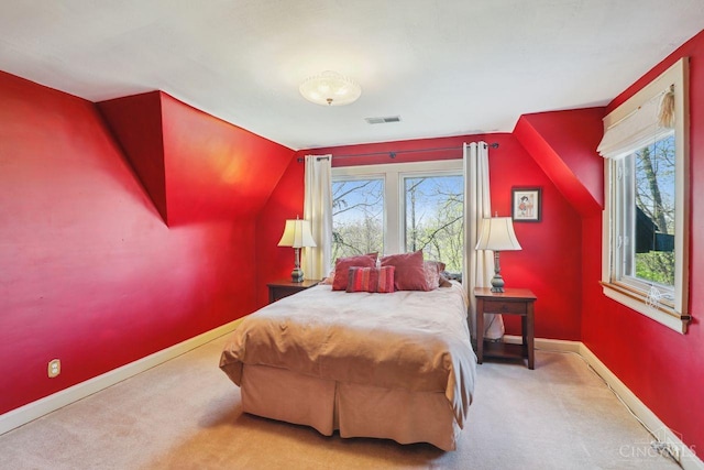 3725 Dogwood Ln, Columbia Twp, OH 45213 - carpeted bedroom featuring multiple windows and vaulted ceiling
