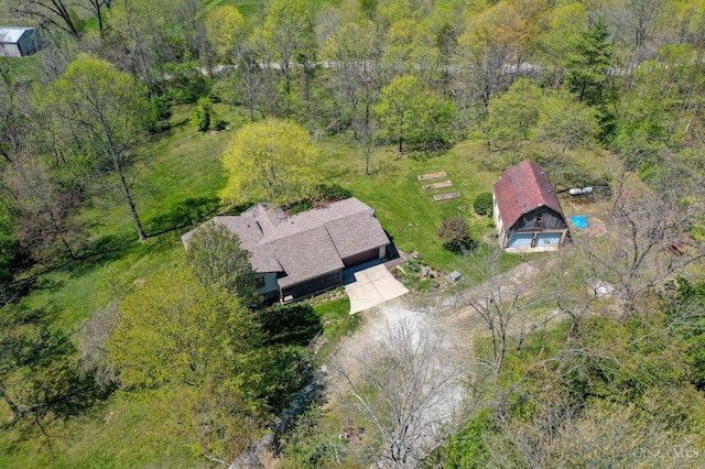 6139 N State Route 48, Clearcreek Twp, OH 45036 - aerial view of property and surrounding area with a heavily wooded area