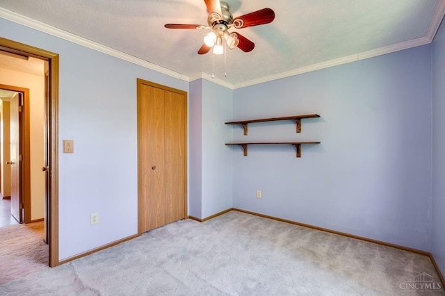 6139 N State Route 48, Clearcreek Twp, OH 45036 - unfurnished bedroom with light carpet, a closet, baseboards, ornamental molding, and ceiling fan