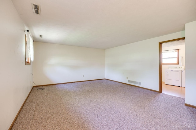 6139 N State Route 48, Clearcreek Twp, OH 45036 - empty room with washer and dryer, carpet, and baseboards