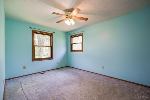 6139 N State Route 48, Clearcreek Twp, OH 45036 - carpeted spare room featuring a ceiling fan and baseboards