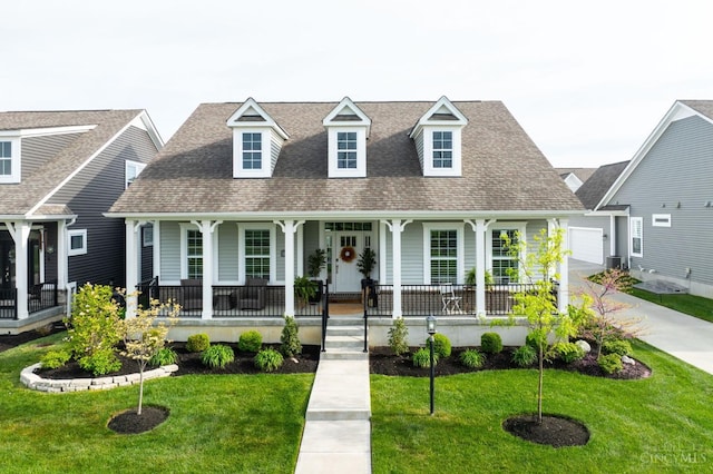 5038 Maiden Way, Liberty Twp, OH 45011 - view of front of house with covered porch, a front lawn, a shingled roof, and a garage