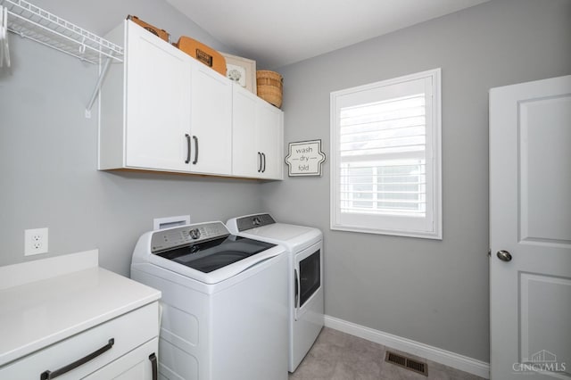 5038 Maiden Way, Liberty Twp, OH 45011 - washroom featuring cabinet space, separate washer and dryer, and baseboards
