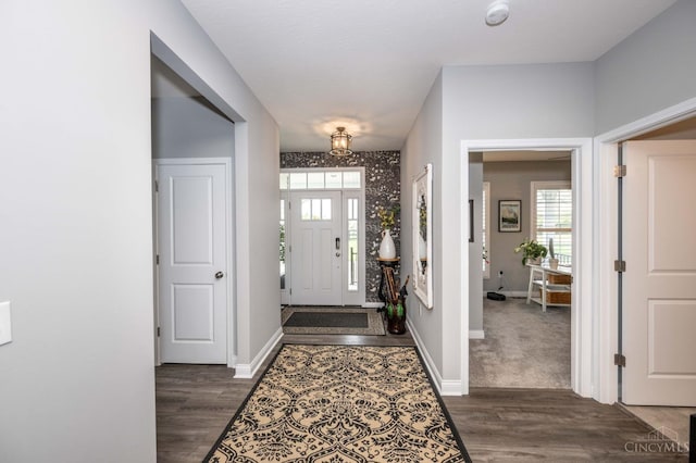 5038 Maiden Way, Liberty Twp, OH 45011 - entryway with dark wood finished floors, healthy amount of natural light, and baseboards