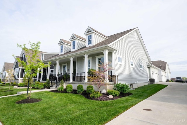 5038 Maiden Way, Liberty Twp, OH 45011 - cape cod house with a porch, a front yard, central AC unit, a garage, and roof with shingles