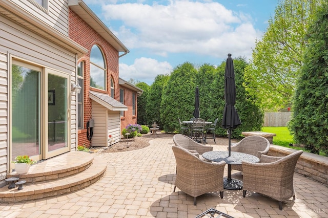 view of patio / terrace with fence and outdoor dining space