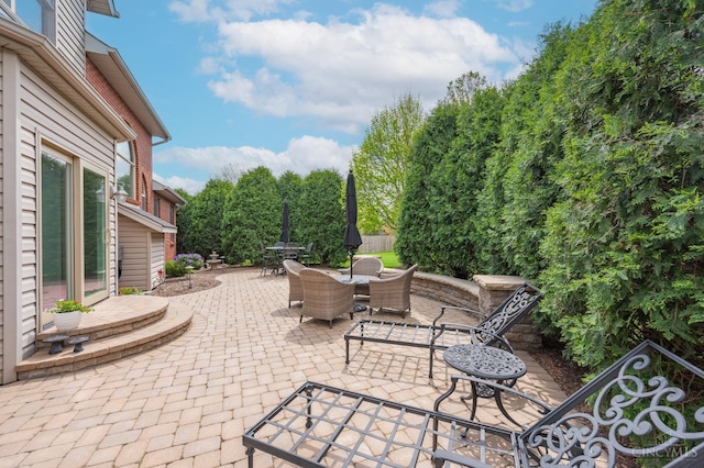 view of patio featuring outdoor dining space