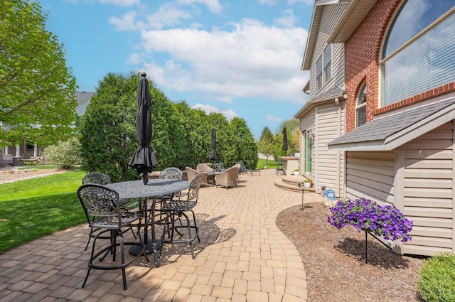 view of patio with outdoor dining area