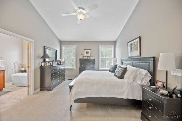 bedroom with baseboards, light colored carpet, ceiling fan, and high vaulted ceiling