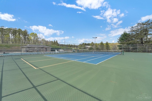 1607 Kato Ln, Marion Twp, OH 43155 - view of tennis court with fence and community basketball court