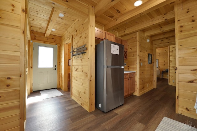 1607 Kato Ln, Marion Twp, OH 43155 - kitchen featuring freestanding refrigerator, wooden ceiling, wooden walls, beamed ceiling, and dark wood-type flooring