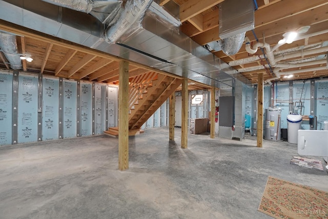 1607 Kato Ln, Marion Twp, OH 43155 - unfinished basement featuring water heater, stairway, and heating unit